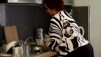 Voluptuous Granny Gets Penetrated In The Kitchen