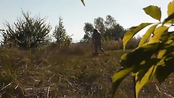 A Guy Catches Sight Of A Naked Blonde Milf Sunbathing On A Nudist Beach